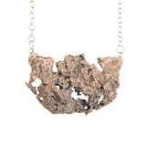 bronze turkey tail fungi necklace
