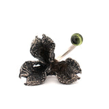 sterling silver adjustable giant peony pod with peridot gemstone ring