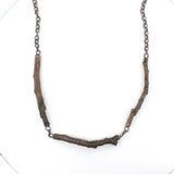 bronze twig trio and sterling silver chain necklace