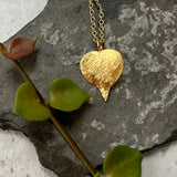 gold vermeil string of hearts necklace